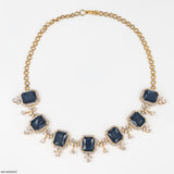 Nestling Emerald Diamond Necklace 9k Yellow Gold