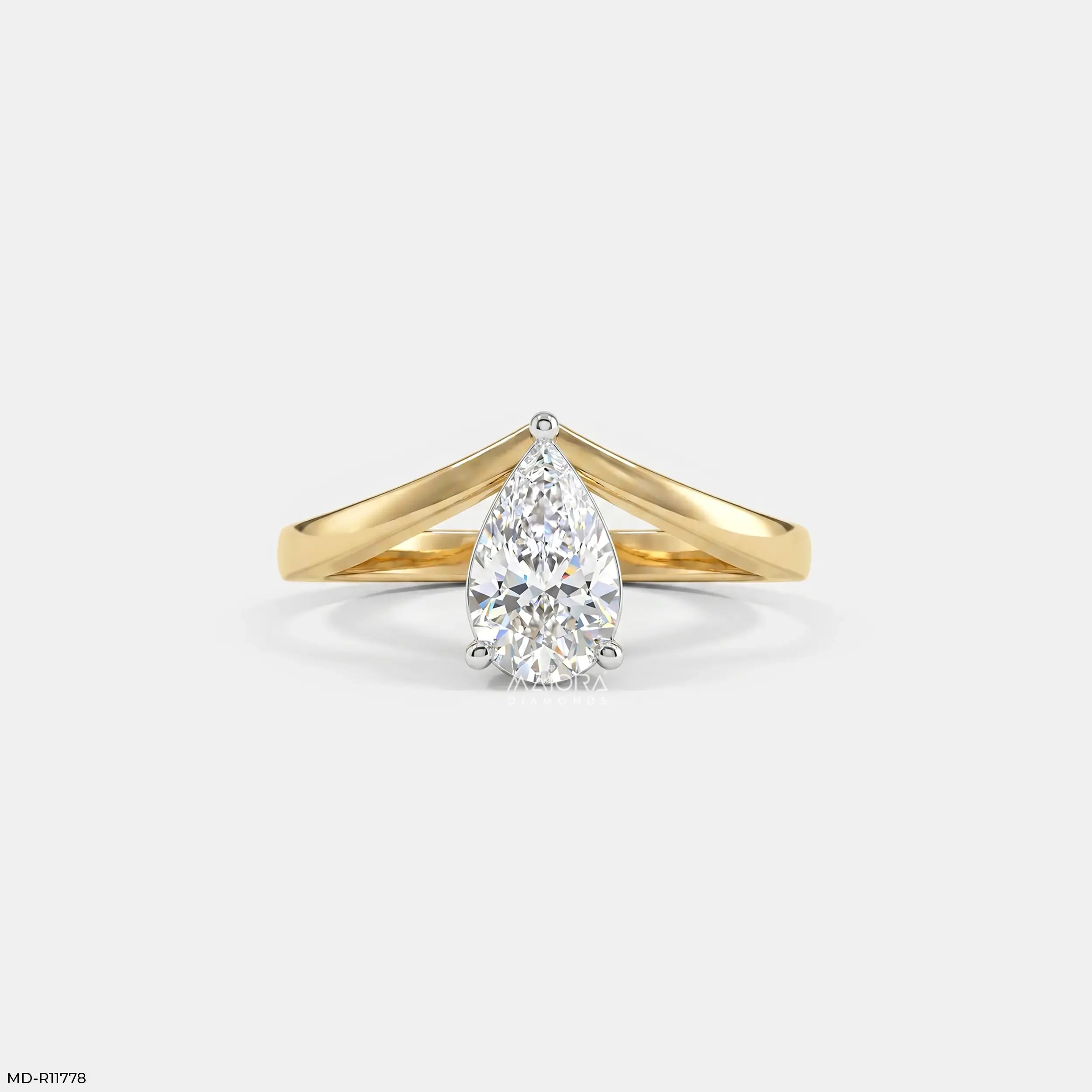 Simply Solitaire Pear Vanki Diamond Ring  9K Yellow Gold