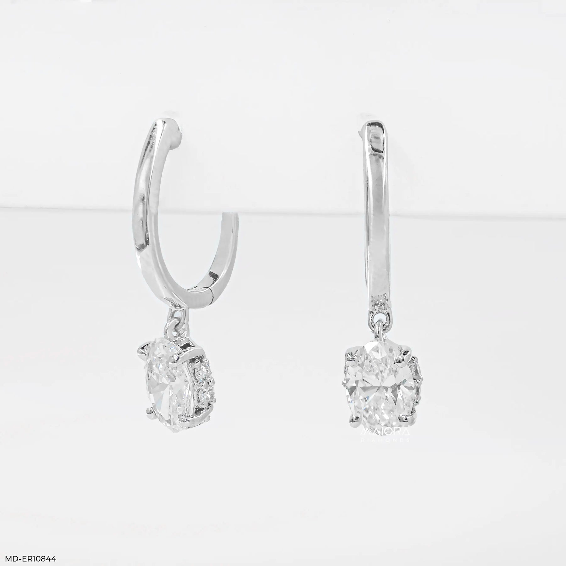 Lumina Oval Solitaire Gold Earrings 9K White Gold