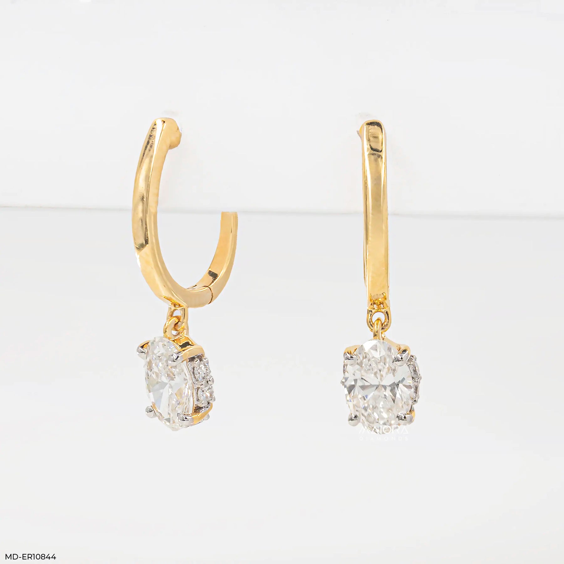 Lumina Oval Solitaire Gold Earrings 9K White Gold