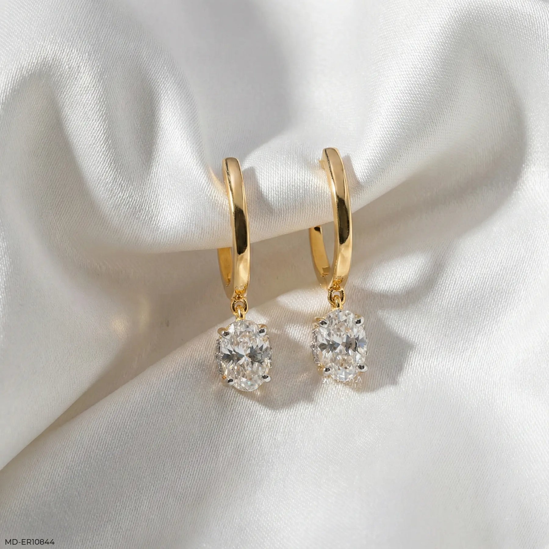 Lumina Oval Solitaire Gold Earrings 9K White Gold