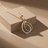 0.30 Carat Modern Teardrop Interlock Lab Diamond Pendant 14K Yellow Gold