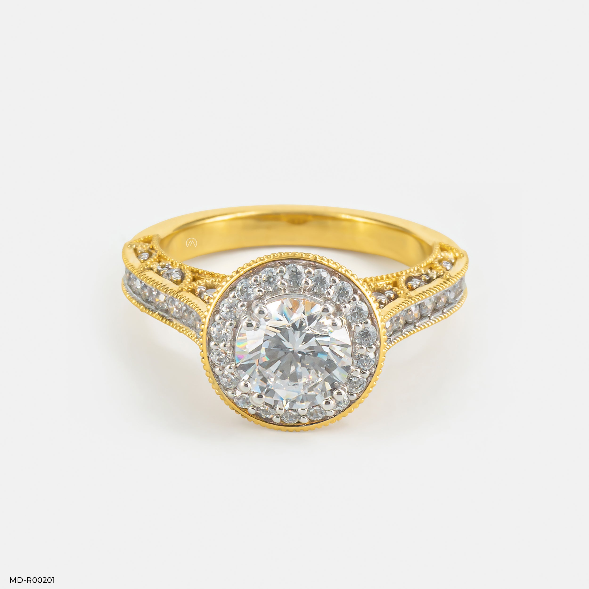 The Round Brilliant Vintage Halo Ring