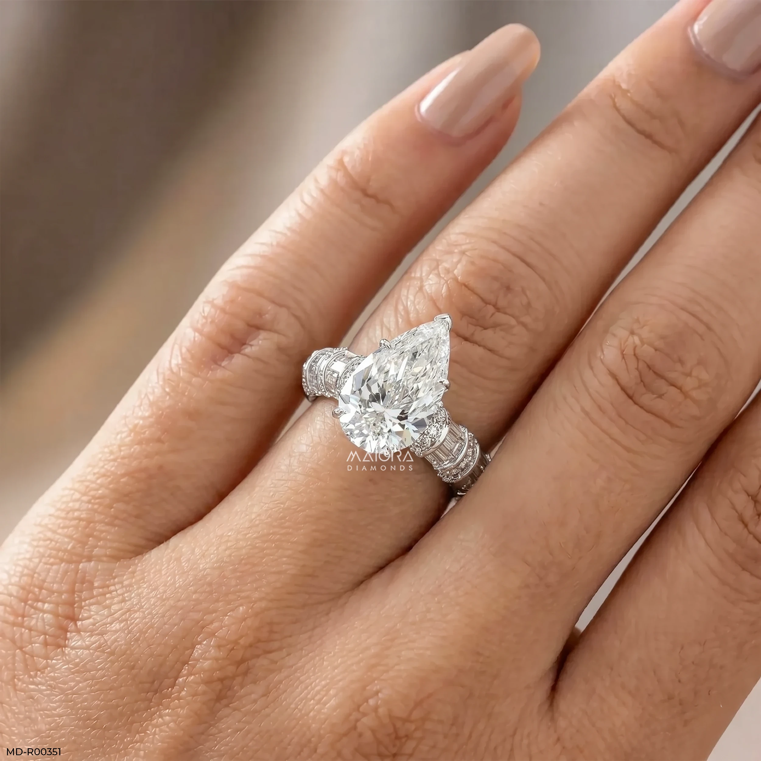 Empire Pear Solitaire Diamond Ring