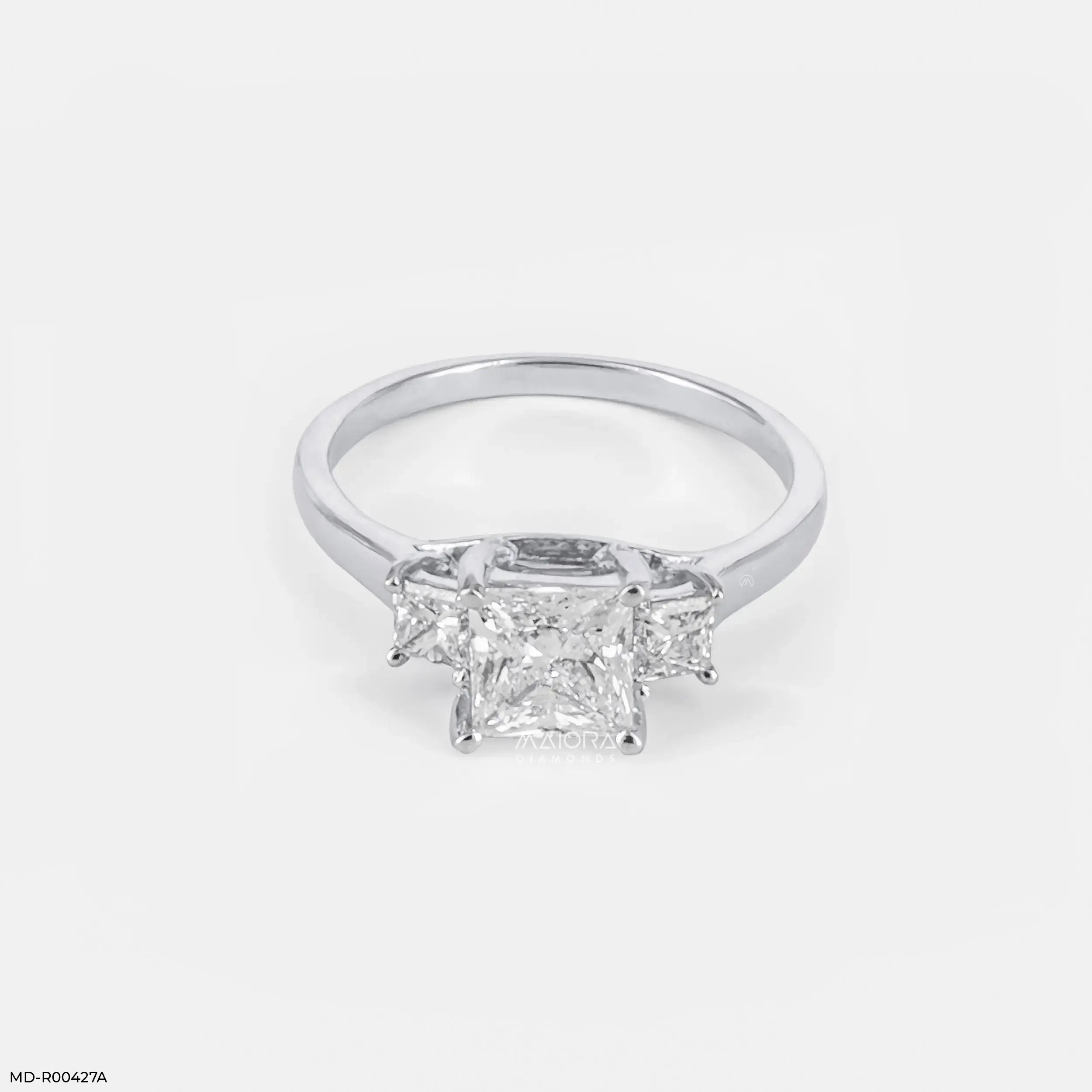 0.95 Carat Princess Three Stone Ring
