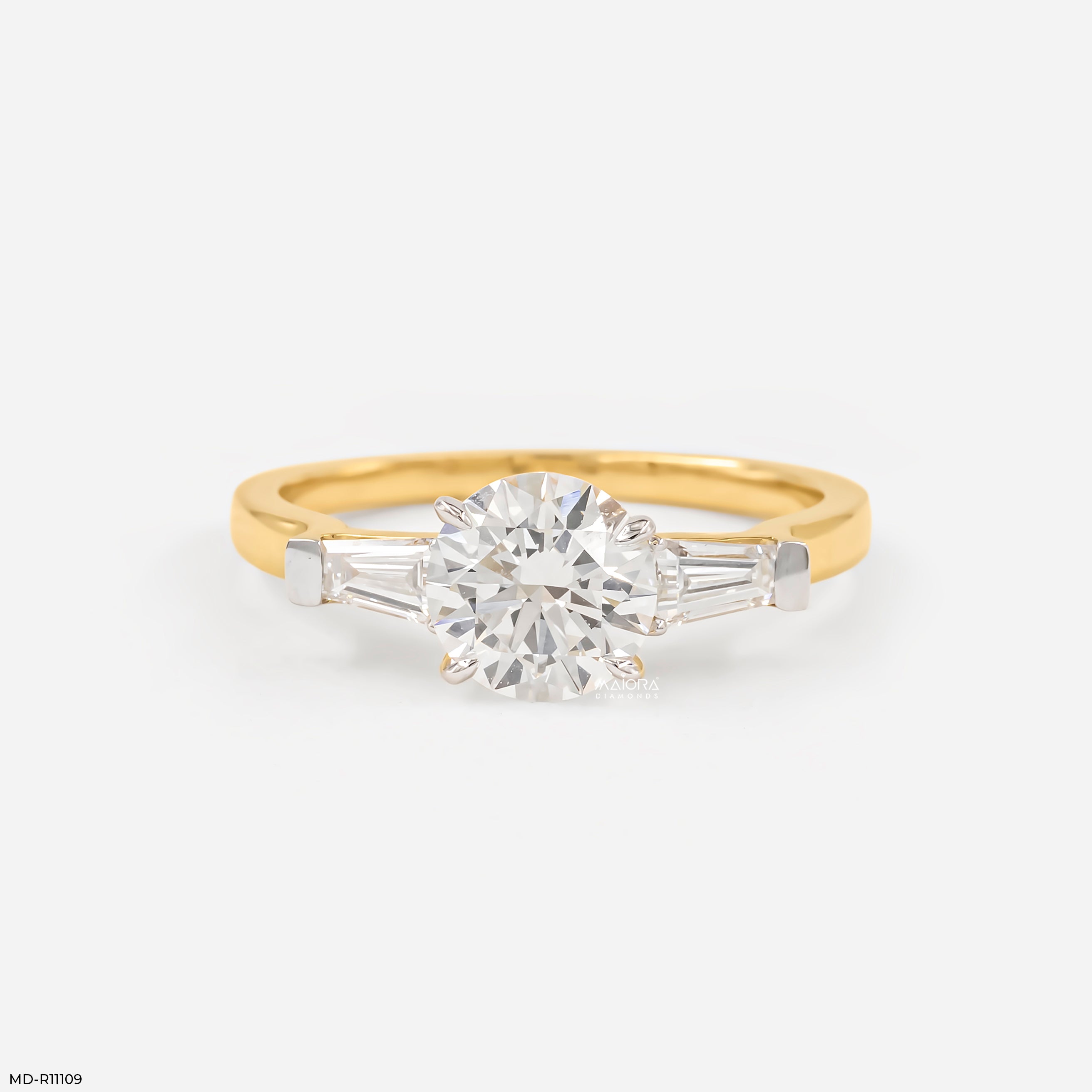 1.35 Carat Classic Trilogy Round and Tapered Baguette Ring