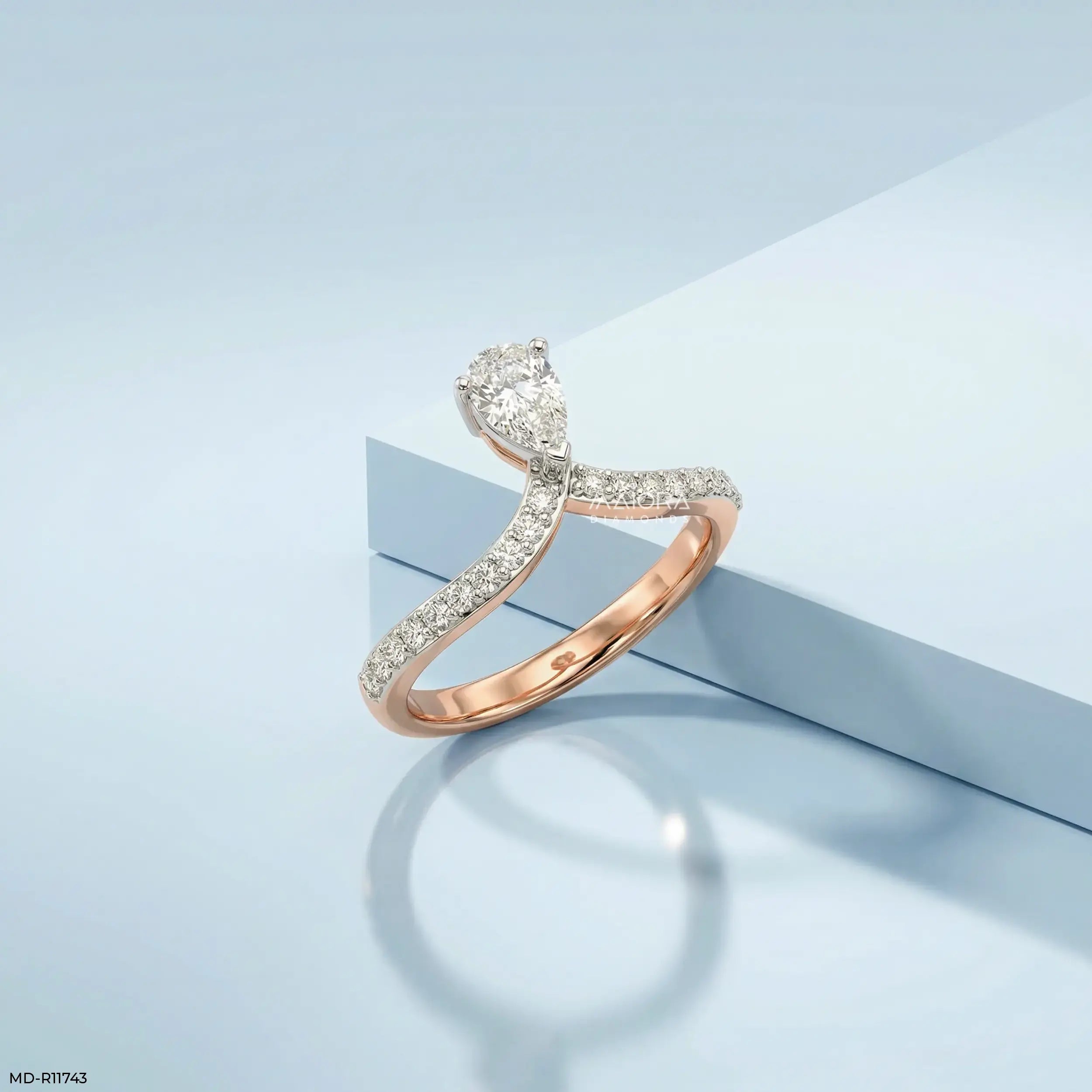 Sleek Curve Pear Vanki Diamond Ring