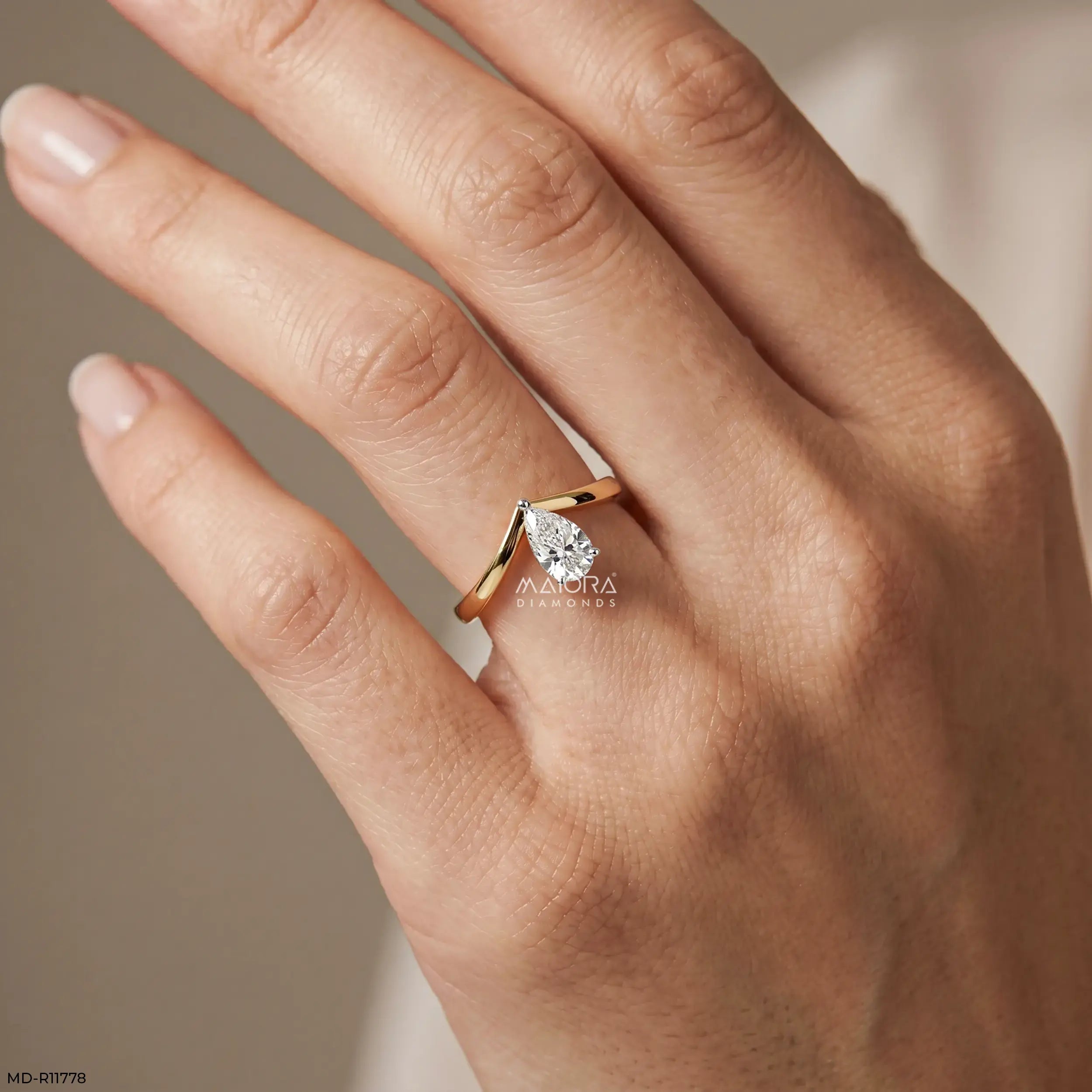 Simply Solitaire Pear Vanki Diamond Ring  9K Yellow Gold