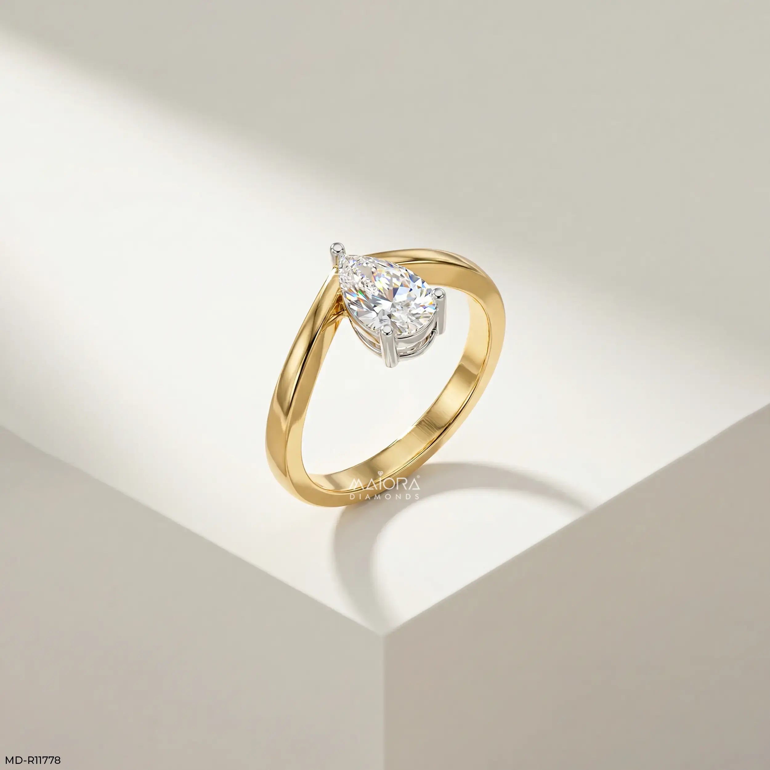 Simply Solitaire Pear Vanki Diamond Ring  9K Yellow Gold
