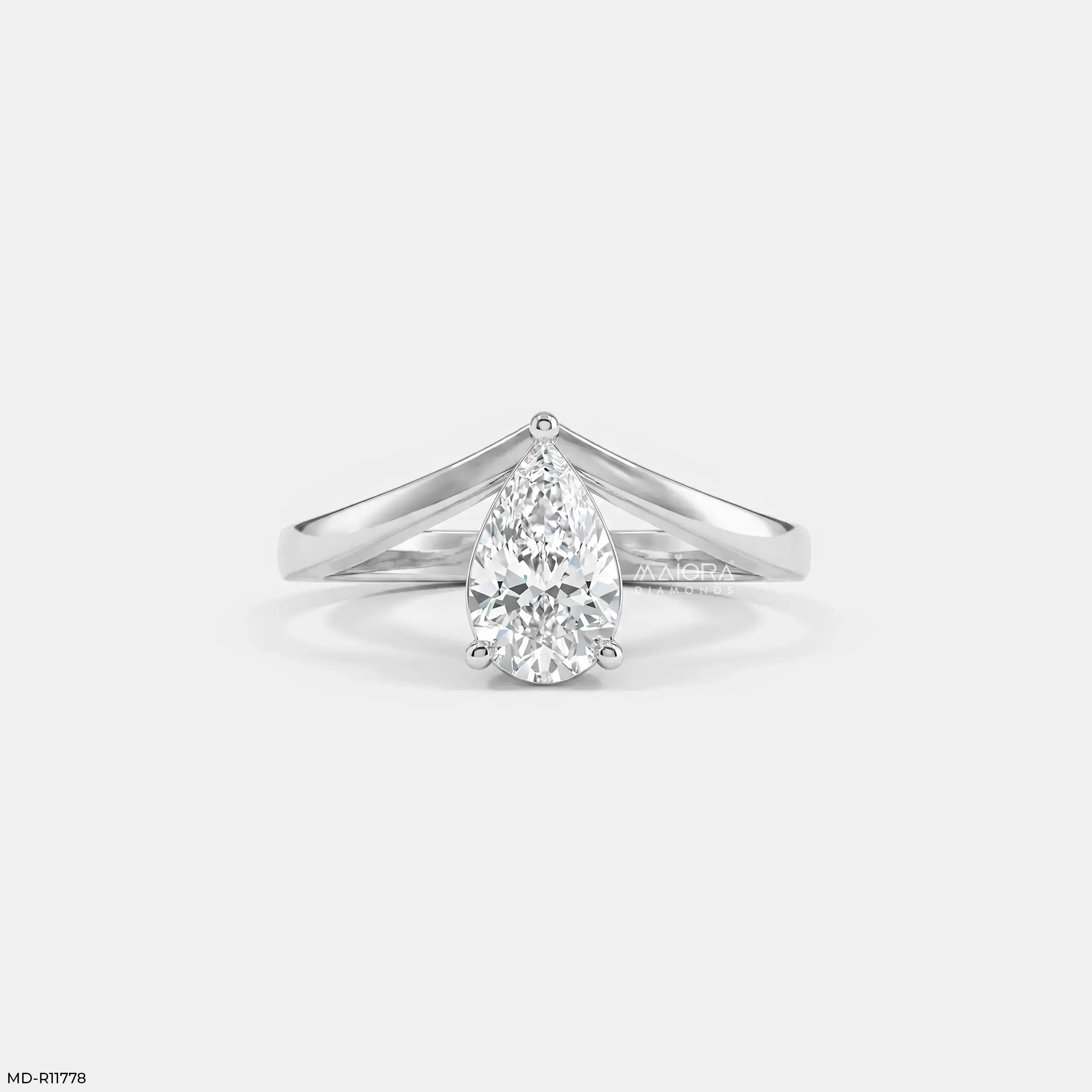 Simply Solitaire Pear Vanki Diamond Ring  9K Yellow Gold