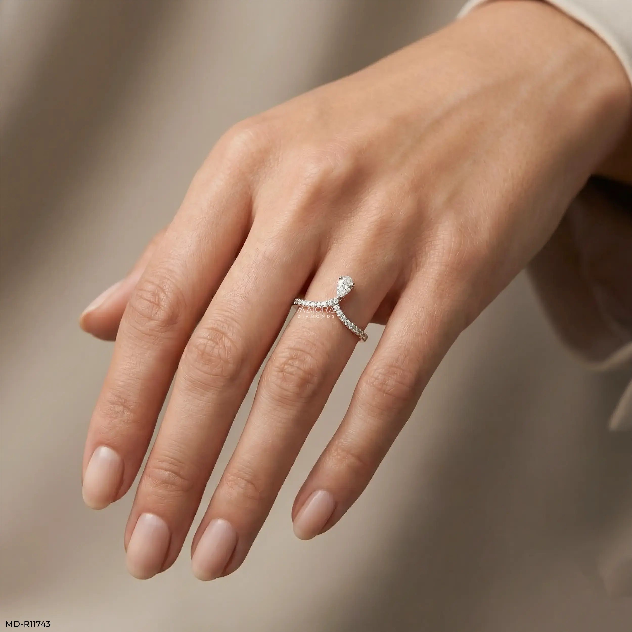 Sleek Curve Pear Vanki Diamond Ring 9K Yellow Gold
